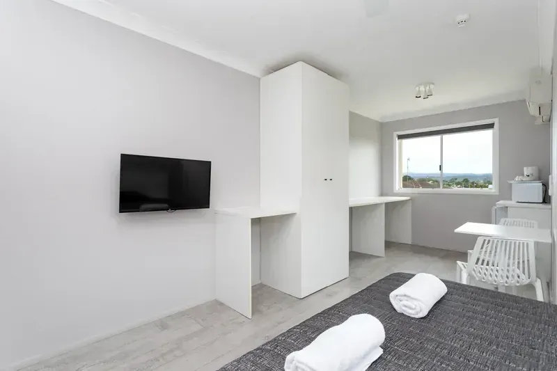 Guest room interior at Coastal Mile Motel